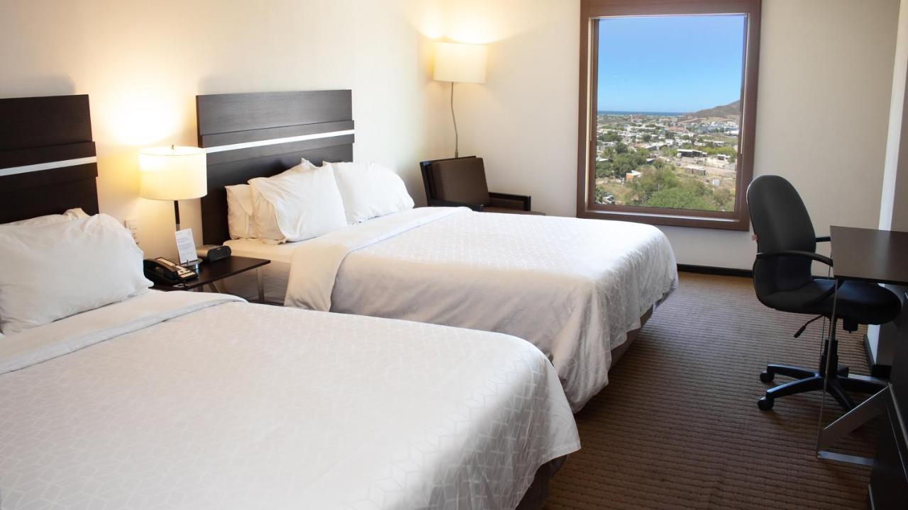 홀리데이 인 익스프레스 과이마스 호텔 외부 사진 A typical room at the Best Western Premier Executive Residency